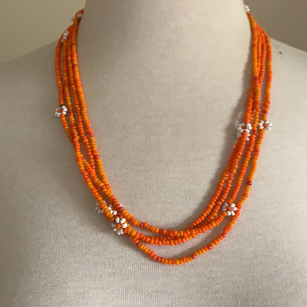 Two orange beaded art deco necklace